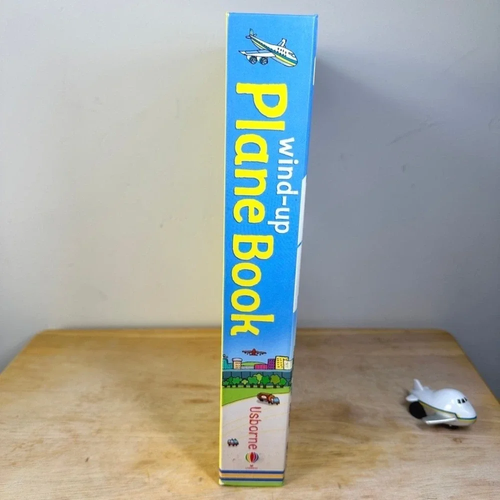 Usborne Wind-up Plane Book with Model Plane and 3 Tracks‎ Interactive Hardcover